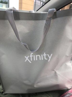 Xfinity bag with a router inside.