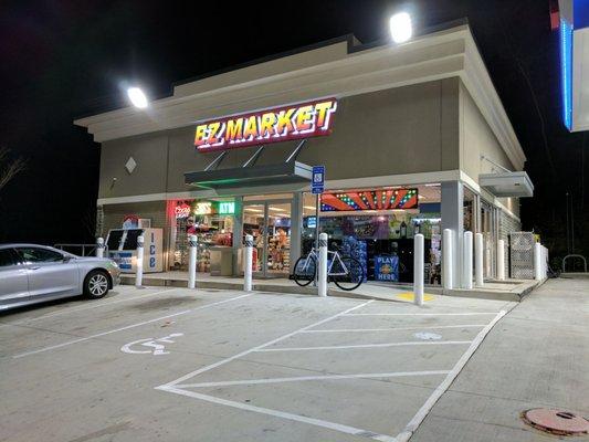 Outside EZ Market, the convenience store. Storefront.