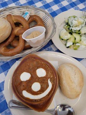 Munich Bread Basket, Cucumber Salad and Goulash with Hot Roll