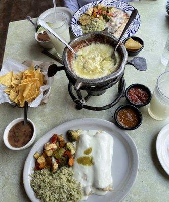 Queso fundido with corn tortillas, shrimp enchiladas, pineapple salmon and margaritas!!!