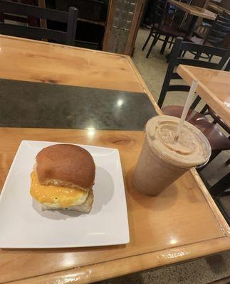 Breakfast Sandwich w/ sausage paired with the 16 oz. Kick Starter Smoothie