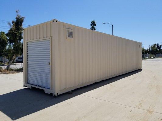 Used 40ft container w/ new exterior paint & roll up door modification