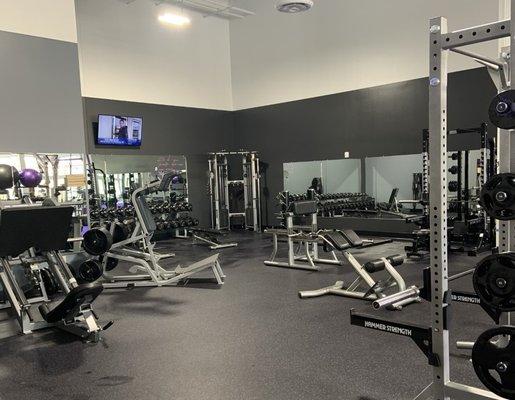 Free weight section includes dumbbells, squat rack, Smith machine, hip sled, deadlift platform and more!