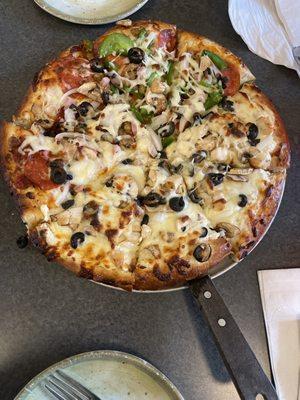 Half n half pizza. Monument with two slices minus green pepper and Philly chicken minus green pepper add black olives.