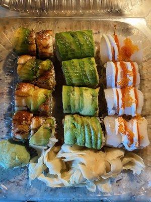 takeout: dragon roll (left) caterpillar roll (middle), lazy roll (right)