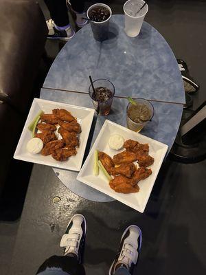 Chicken wings and drinks bought right to the lanes