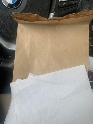 Classic deli- paper bag with 3 large napkins folded on top