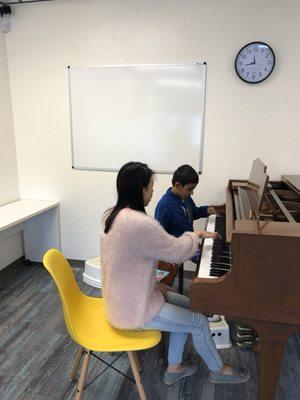 Ms. Nancy and Tanish counting the keys together