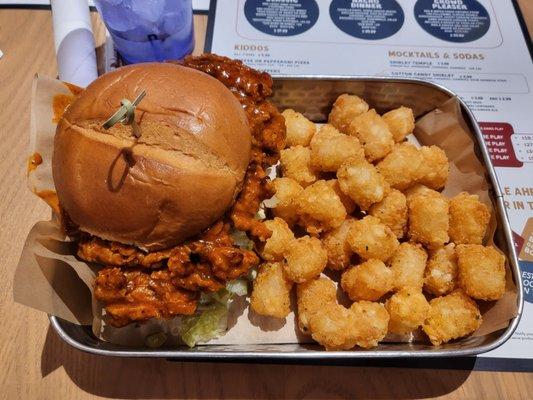 Nashville chicken sandwich with tots