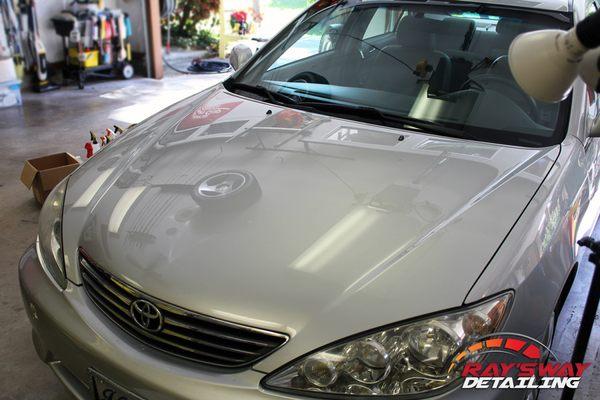 Reflection shot on the hood of a 2007 Toyota Camry after polishing.