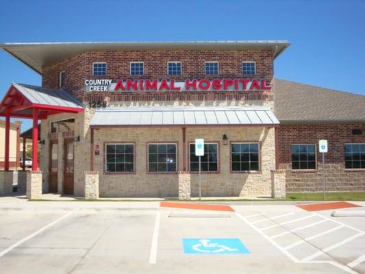 Parking lot view of clinic sign facing Exchange Pkwy