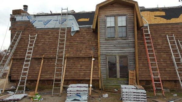 Complete mansard roof replacement during progression. This is as steep as it gets.