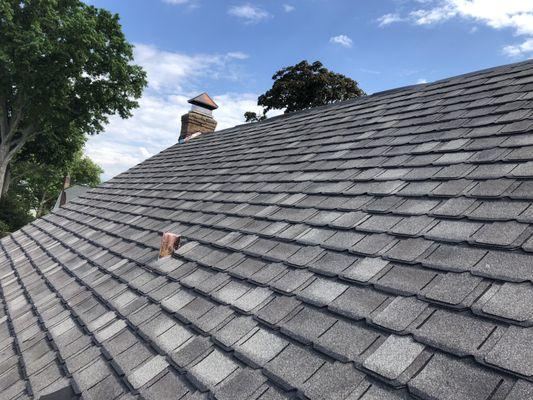 GAF Camelot shingles with a custom copper vent pipe flashing.