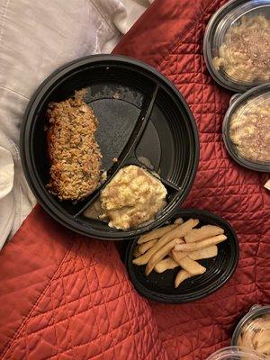 Steak Fries (large), mashed potatoes with brown gravy, and meatloaf