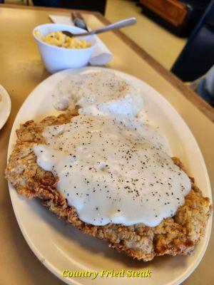 Country fried steak, mashed potatoes and mac n cheese