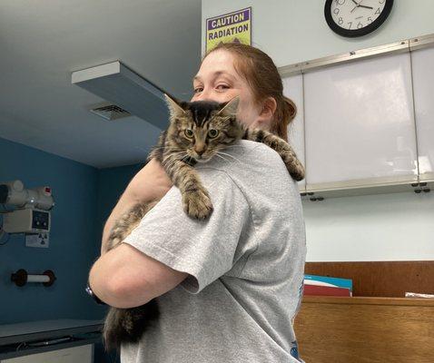 Cortney our CSR snuggling with "Hoppy" after surgery.