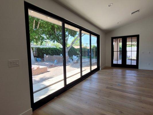 Stunning Andersen multislide door accompanied by a double French Door