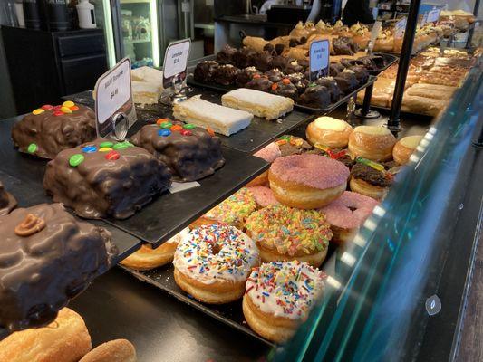 Donut case with a portion of the large selection