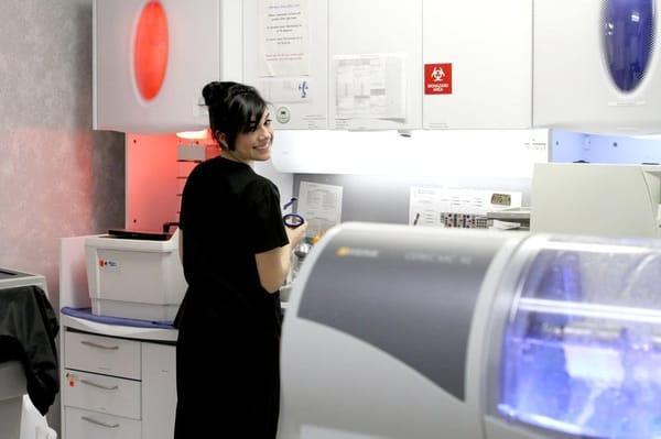 One of our dental assistants working in the lab