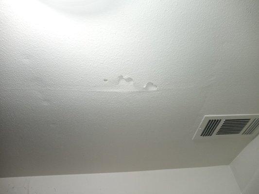 Ceiling bucking and dripping.