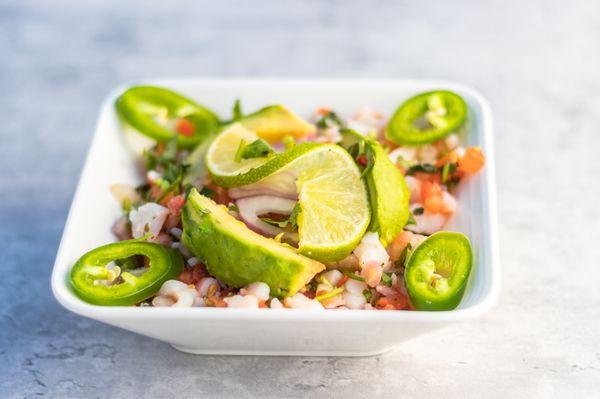 CEVICHE DE CAMARONES Citrus marinated shrimp served chilled with pico de gallo, avocado, jalapeños & limes