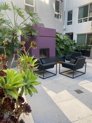 Chairs and fireplace area right outside my unit