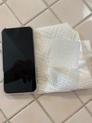 Large cube ice next to an iPhone X for scale. These Ice cubes are awesome and perfect for cocktails