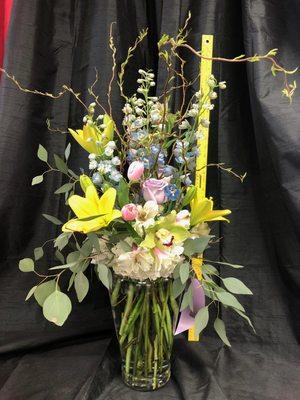 amazing the picture does not do it justice. Orchids, roses, tulips, delphinium, lilies! WOW