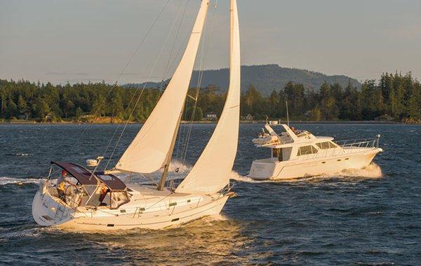 Sailboat and power boat cruising in the San Juan Islands.