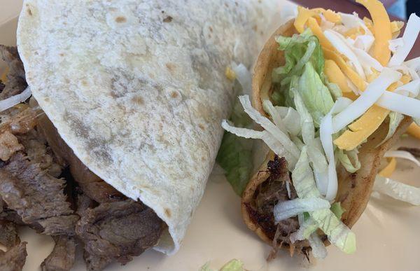 Close-up of the Friday special soft taco and a single crispy shredded beef taco