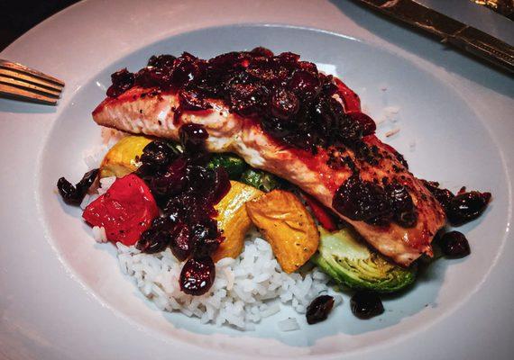 Salmin over rice with craisin berry reduction special