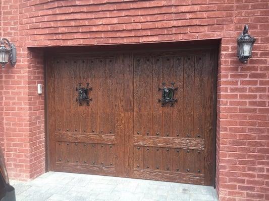 Custom Faux wood garage door with Speak Easy Windows