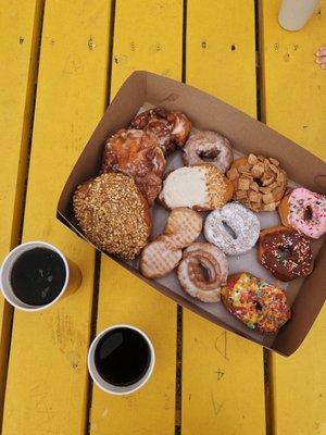 A dozen donuts & coffee