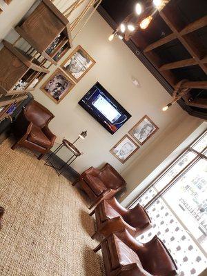 Relax in our waiting area with a complimentary cold beer or bourbon before or after your haircut!