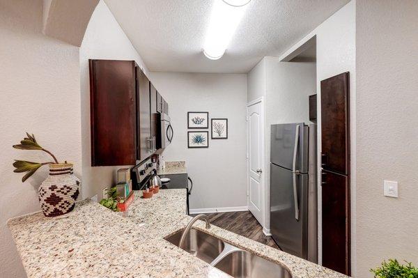 Open kitchen with stainless appliances