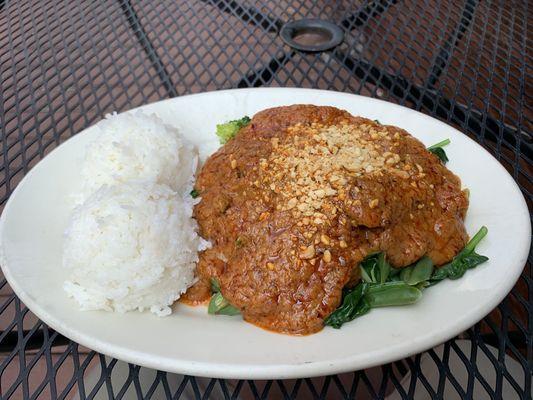 Pra Ram with fried tofu.  Spice level 4 isn't spicy in this particular dish.  So full of creamy peanut goodness!