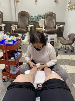 Me getting my toes done after a year and a half!