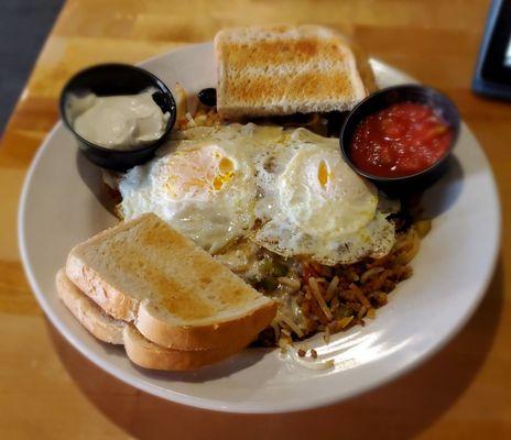 Tex Mex Skillet with eggs over easy and sit cream/salsa asked for on the side