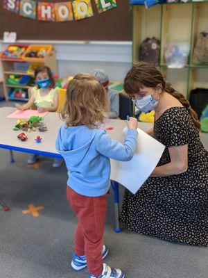 Playing with a torch light in preK