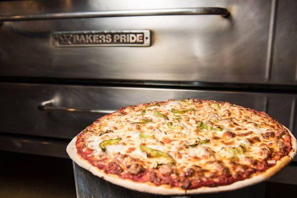 Pizza served fresh out of our stone hearth ovens.