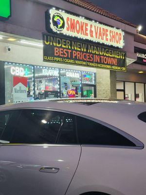 Under new management and best prices in the Valley sign.