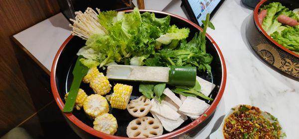 Ettice, enoki, lotus root, corn, taro, snow pea leaves