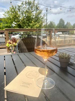 Relaxing on the patio at Beyond the Vine, this glass of skin-contact pinot gris from Approachment Winery was positively glowing orange.