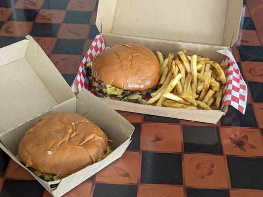 Two Rebel burgers with special fries