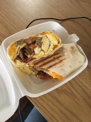 Breakfast burrito- your choice of white or wheat, $5.25 total after tax