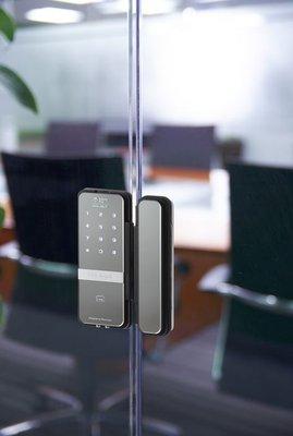 Card reader and proximity access unit installed on frameless glass Door.