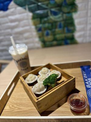 Shanghai dumplings with 1908 milk tea and cheese mousse