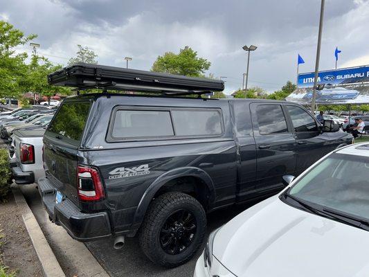 Camper shell and the aluminum tent