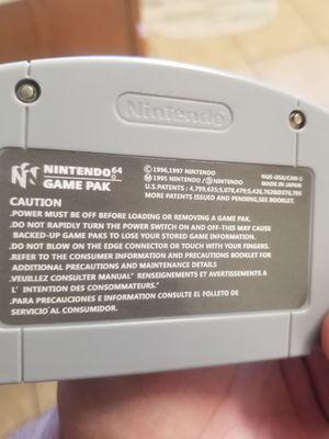 Circle I on the NINTENDO. Dark color behind the lettering FAKE!