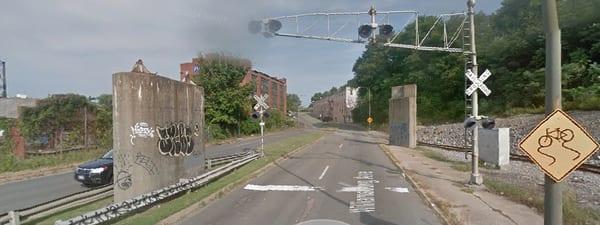 NOTICE, The random bridge supports in this photo on Williamsburg Ave. the former line crossed here south to Nicholson St.